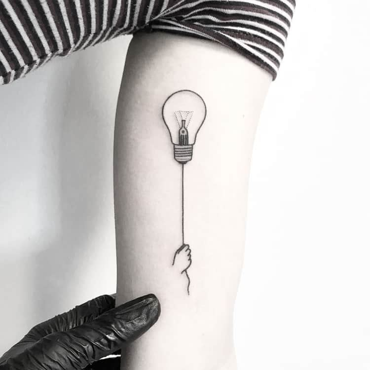 Lightbulb and Hand Tattoo by Pokeeeeeeeoh