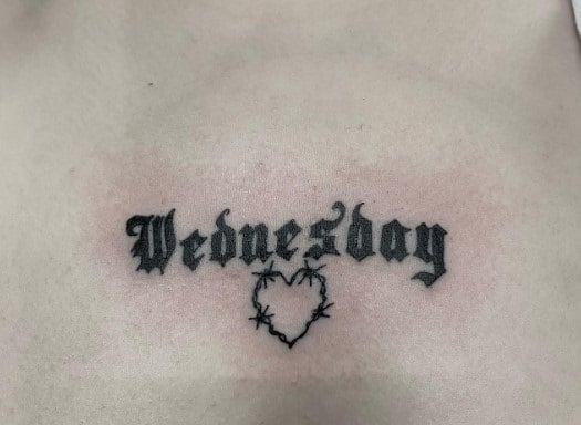 What Does a Wednesday Tattoo Mean, Historical Significance of Wednesday, Symbolism of Wednesday Tattoo, Popular Wednesday Tattoo Designs, Choosing the Right Wednesday Tattoo, What is the symbolism behind a tattoo of Wednesday Addams, Why do people get tattoos of Wednesday Addams, What is the significance of Wednesday Addams' tattoo,