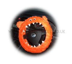 Orange fuzzy faux fur monster steering wheel cover with googly eyes