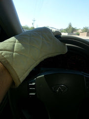 Oven mitt / glove holding a steering wheel 