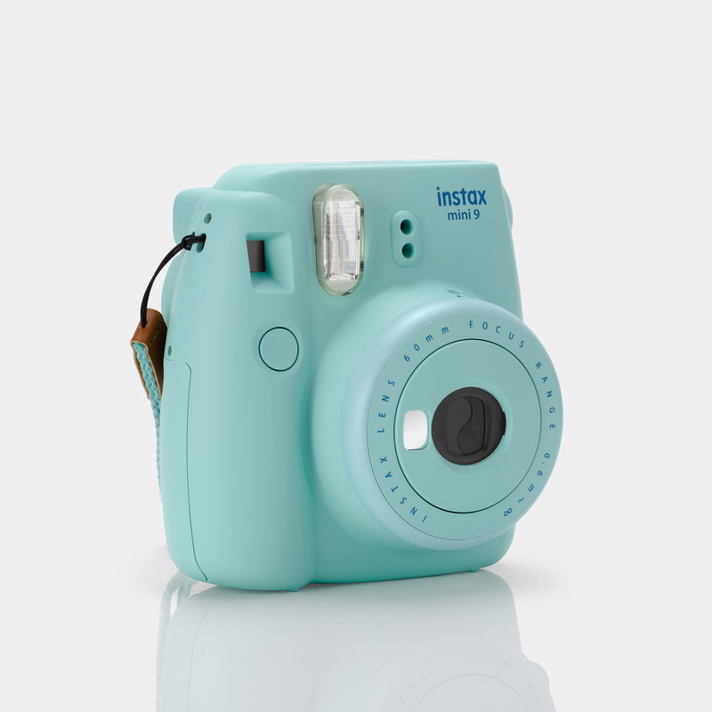 sirene arm spellen Fujifilm Instax Mini 9 Teal Instant Film Camera With White Bag - Refur –  Retrospekt