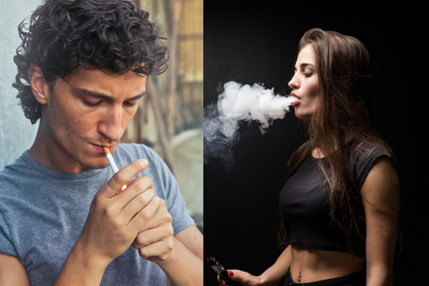 A man smoking a traditional cigarette while a woman exhales vapor from an electronic cigarette.