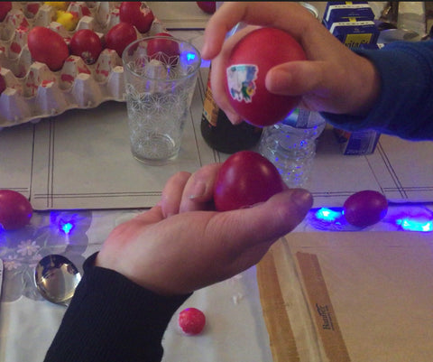 Traditional Greek Orthodox Red Eggs - cracking the egg