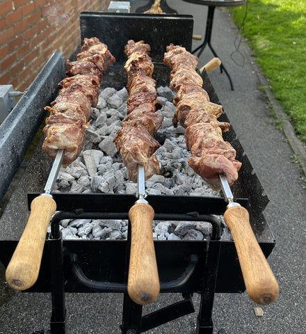 Souvla on a Modern Black Cypriot Rotisserie BBQ