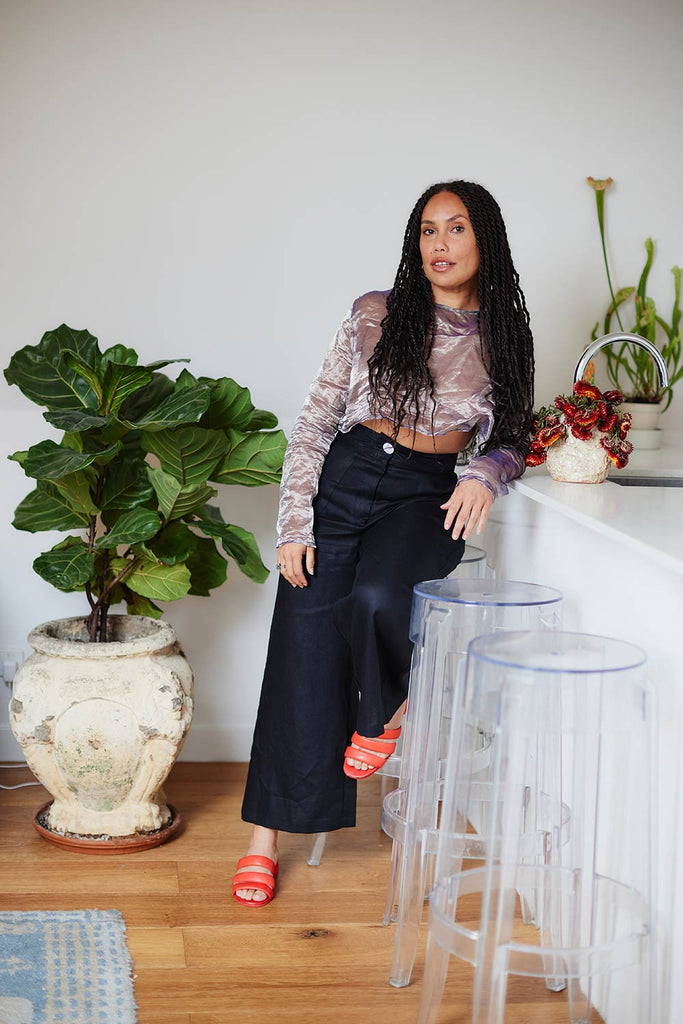 Women sitting on stool wearing Amani Culotte Pants