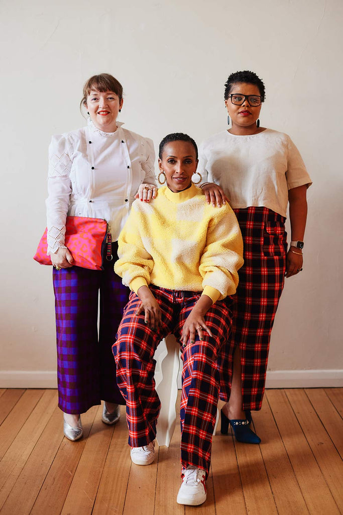 3 women wearing Collective Closets
