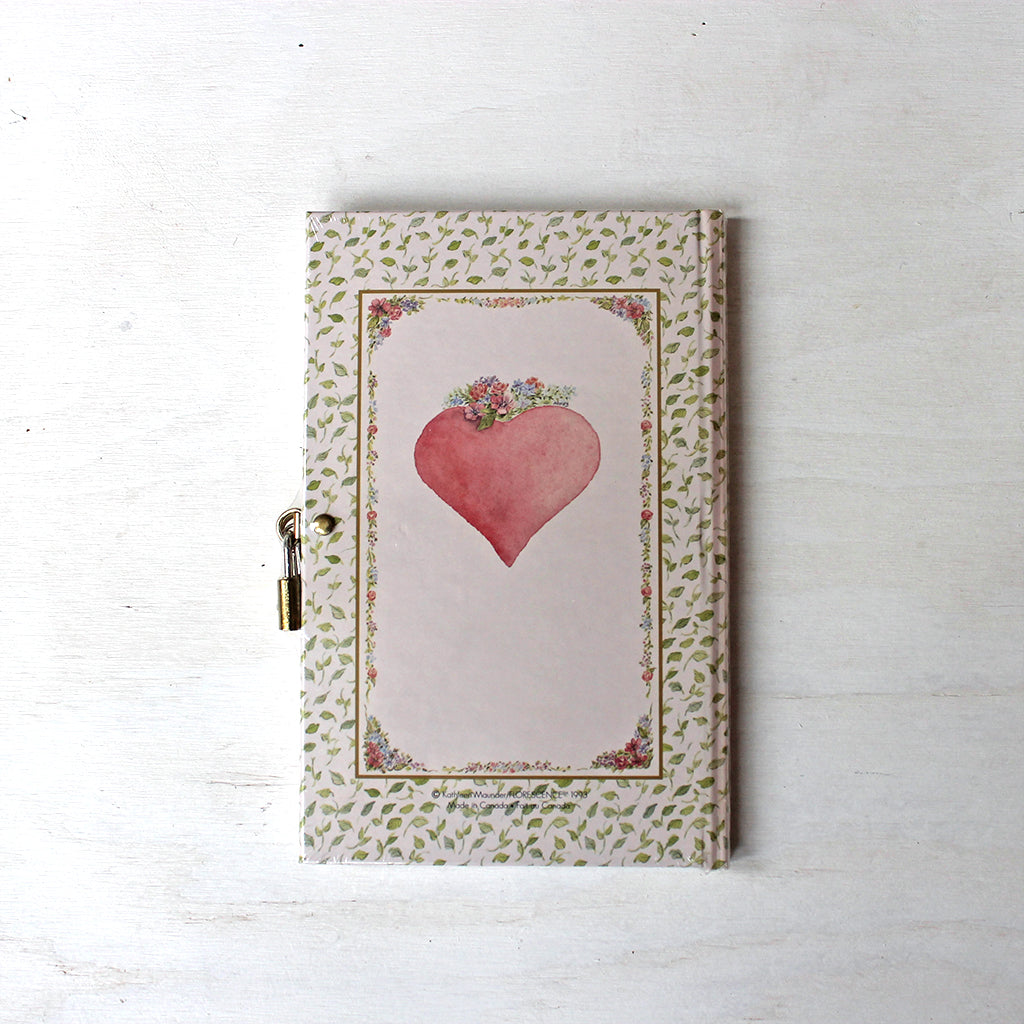 Back cover of Pink Heart diary. With lock and key. Featuring watercolor art by Kathleen Maunder.