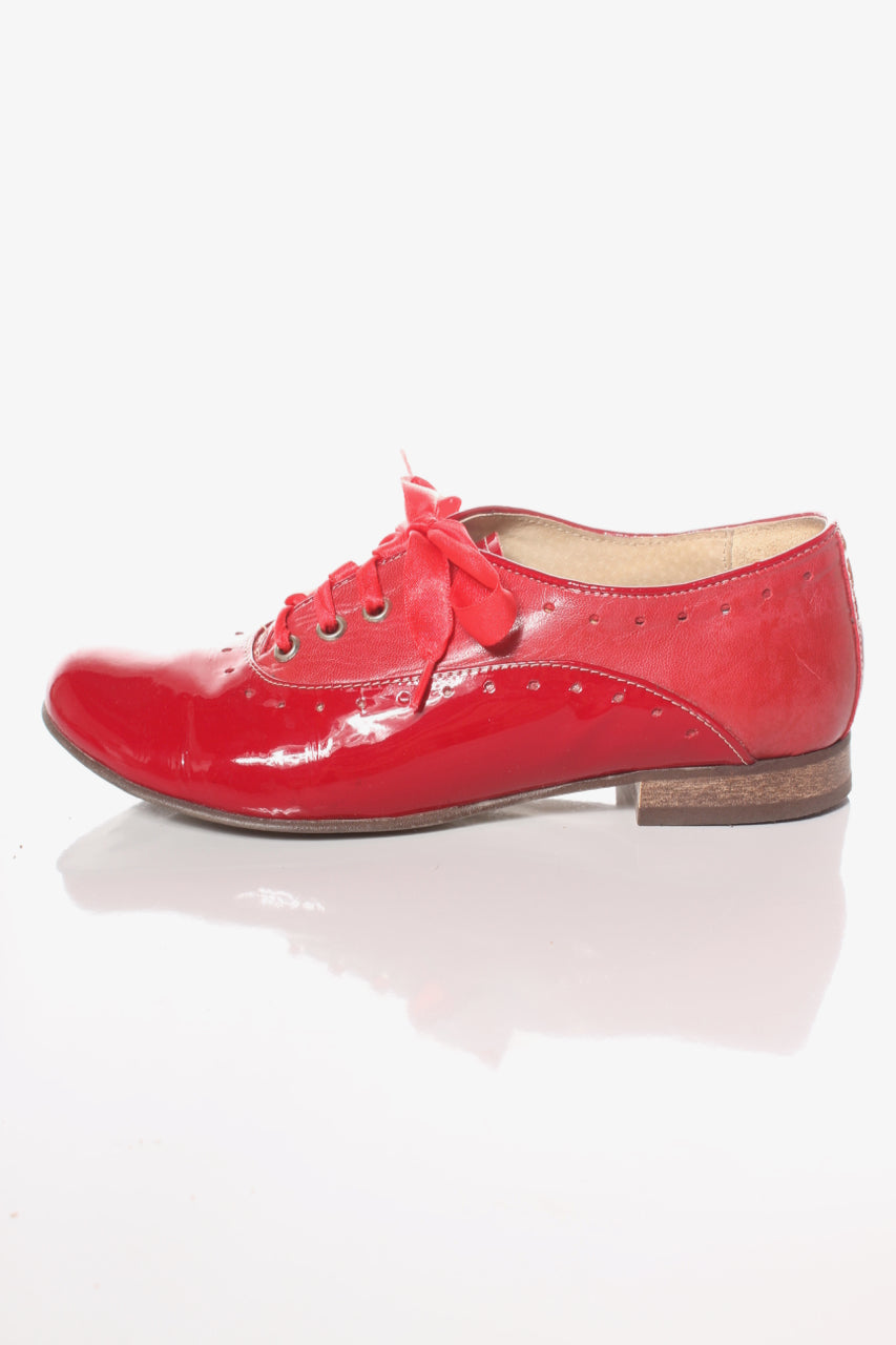 red colour leather shoes