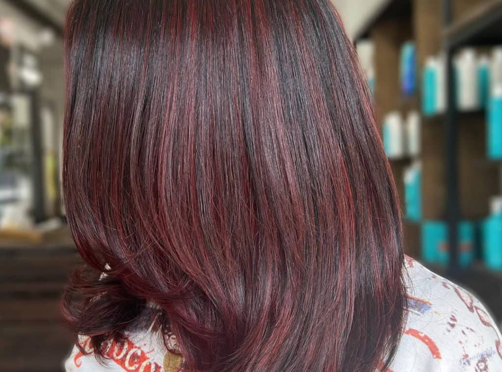 Dark red balayage for black hair