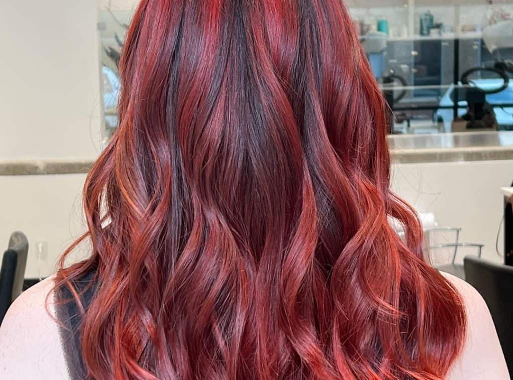 Balayage red highlights idea for black hair