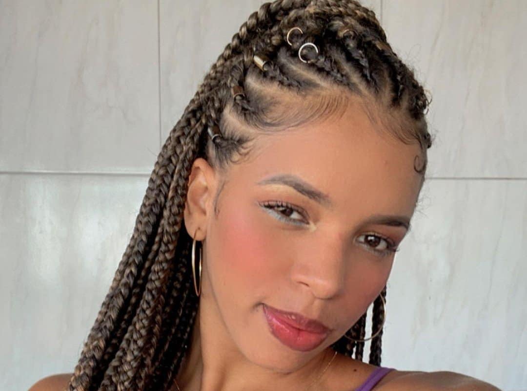 girl with dark brown fulani tribal braids