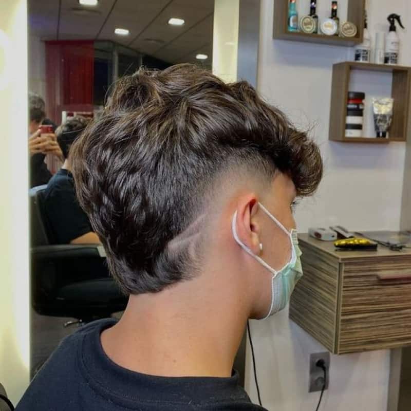 Boy with a lightning bolt hairstyle