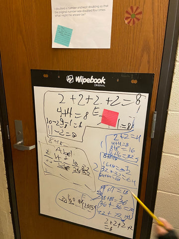 A display of students work on the thinking task of doubling numbers
