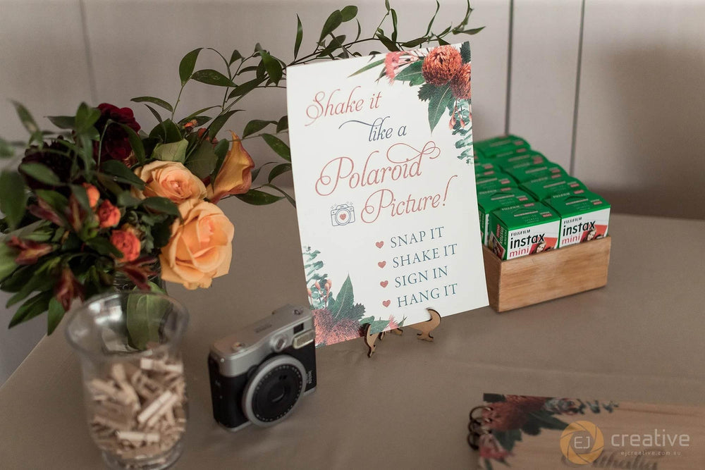 polaroid guest book sign.webp