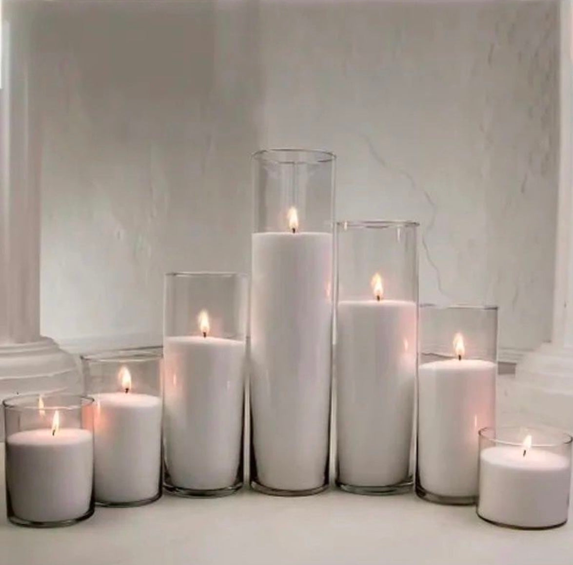 white sand wax in glass containers