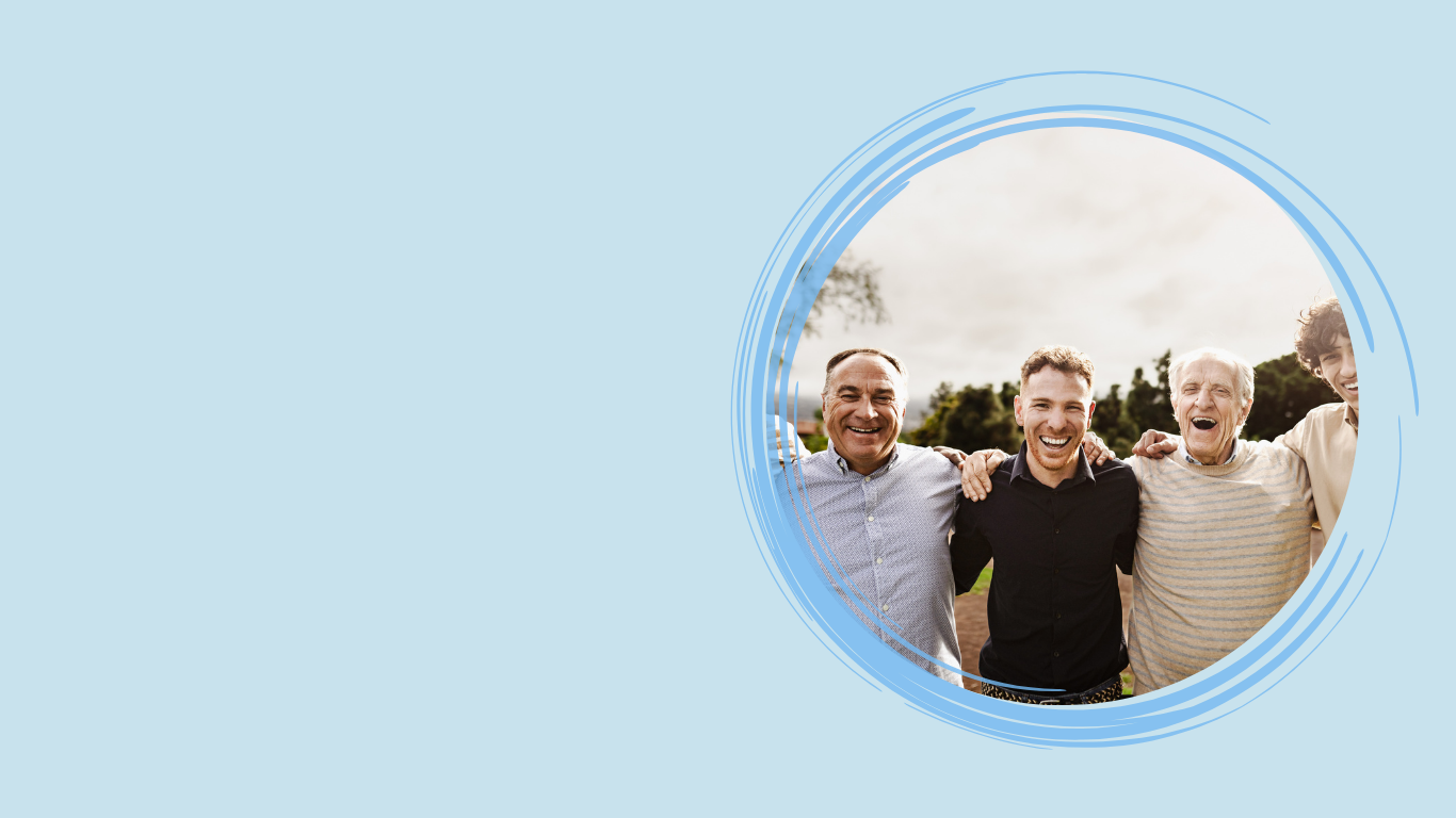 Four people smiling and standing close together outdoors within a blue circular frame.