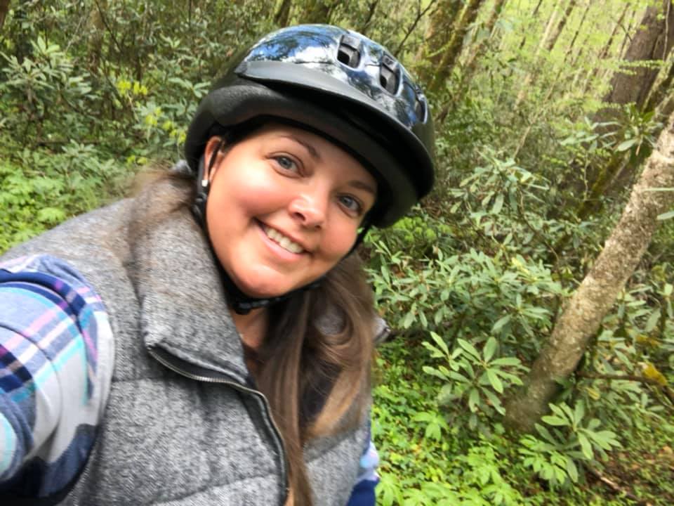 horseback rider happily sharing a selfie on the trail