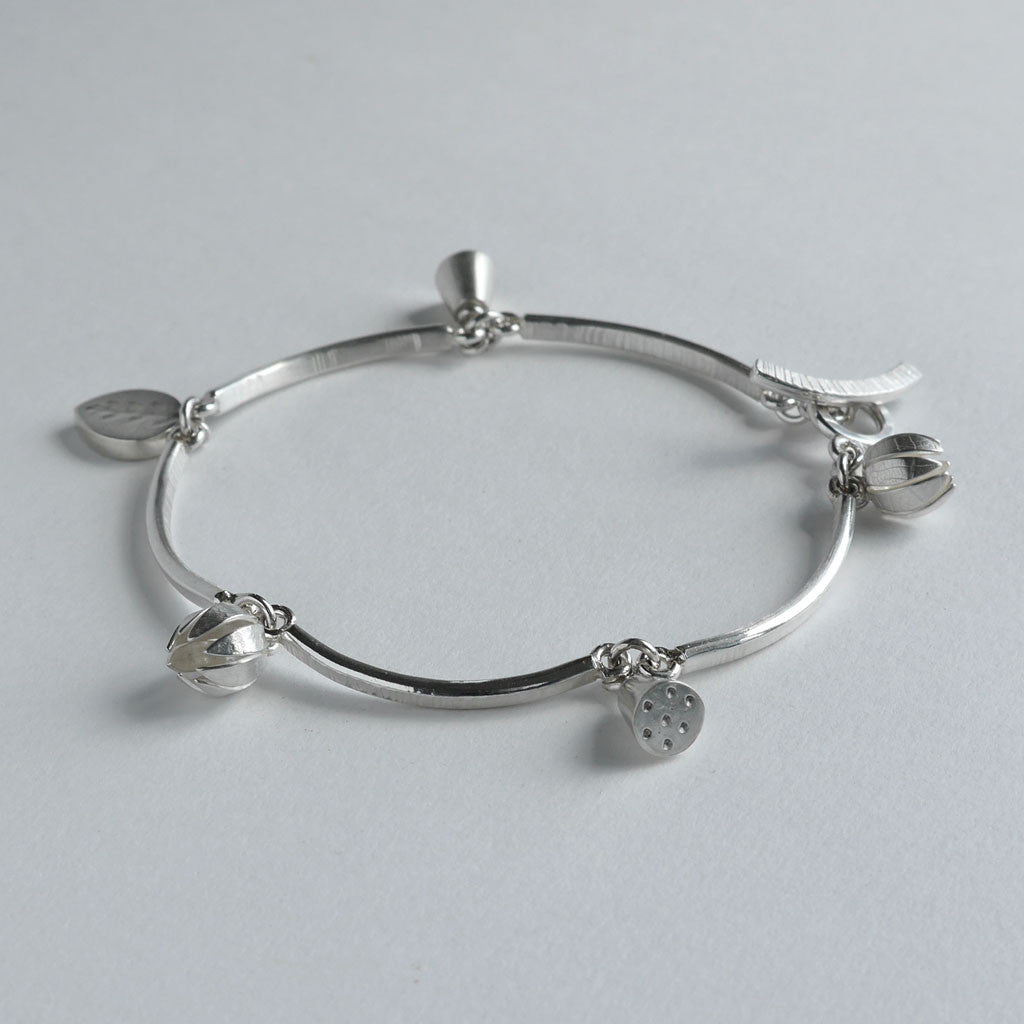 Lily charm bracelet – Naomi James