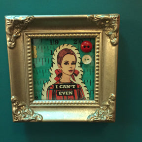 Mini mixed media personality adjustment pieces by local artist Delaine Derry Green. $25.00.