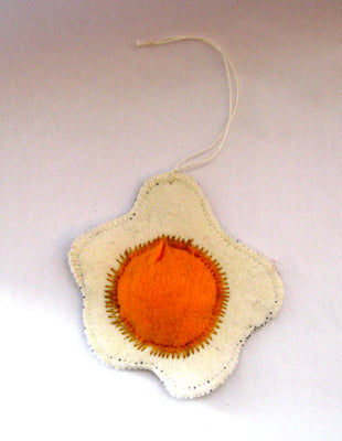 Fried egg ornaments by local artist Véro. $12.00