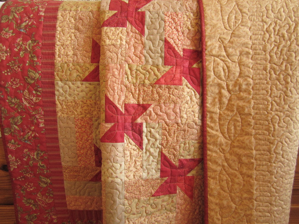 red and tan quilts