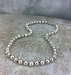 Expertly knotted pearl strand by No Roses Jewelry Studio