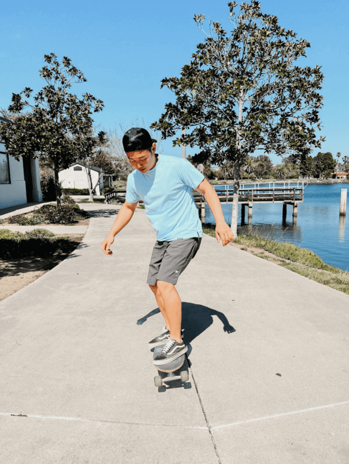 Moses Cho skateboards in a Truewerk B1 Sun Tee and Cloud Shorts