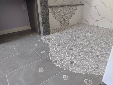 A bespoke bathroom tile floor installed by Ken Ballin