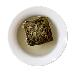 Steeping Immortal Diamond pressed wulong tea