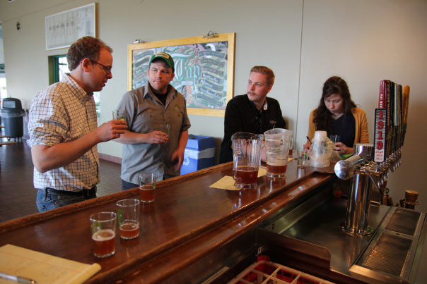 Jess & Timothy tasting the test batch of Make it So with Nick Hempfer and Head Brewer Damian McConn