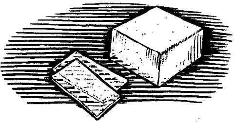 A black and white illustration of mist cheese, a square cheese with two small slices off to the side