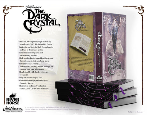 An advetisement for the Dark Crystal Adventure Game. it shows several of the books stacked, with one propped open on top. The covers and spines of the books are showing, but not the interior contents. A list of game components, and the logos for the Dark Crystal and River Horse Games are seen above and to the left of the image