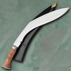 A photo of a kukri, a large knife with a distinct bend
