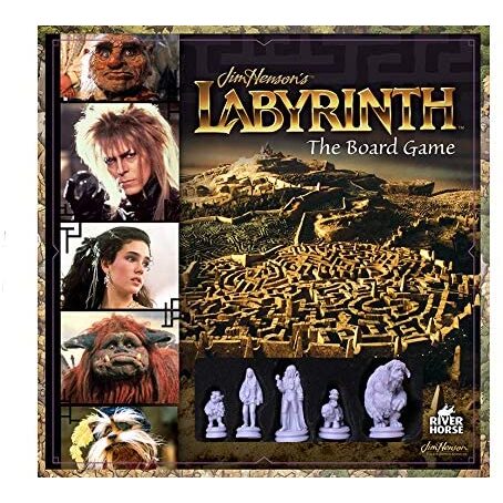 A photo of the box for Labyrinth the Board Game. Several photos from the movie fall down the left side of the box, including a photo of Hoggle, a small muppet, Jareth, David Bowie with fluffy hair and pointed ears, Sarah, a brown haired woman with teased hair and silver jewelry, Ludo, a large animal muppet with orange fur, and Sir Didymus, a small, terrier-like muppet. To the right of that is a photo of the Labyrinth itself, and grey miniatures of each character below. The title of the game spans the top right of the box. 
