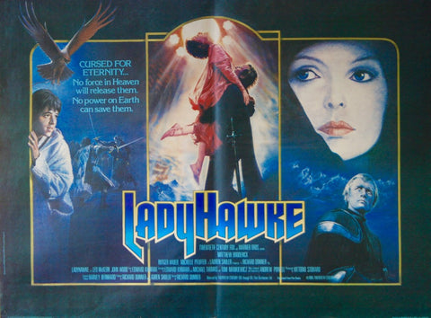 A fold-out poster for the movie LadyHawke. It shows several floating heads on a blue background, surrounding a center image of a man lifting up a woman in an embrace. The title of the movie is below the couple