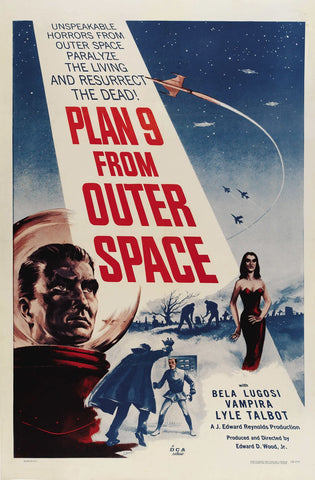 A movie poster for Plan 9 from Outer Space. It shows a white bar descending from the top of the poster with the title of the movie, and a woman in a tight black dress standing next to dark blue figures.