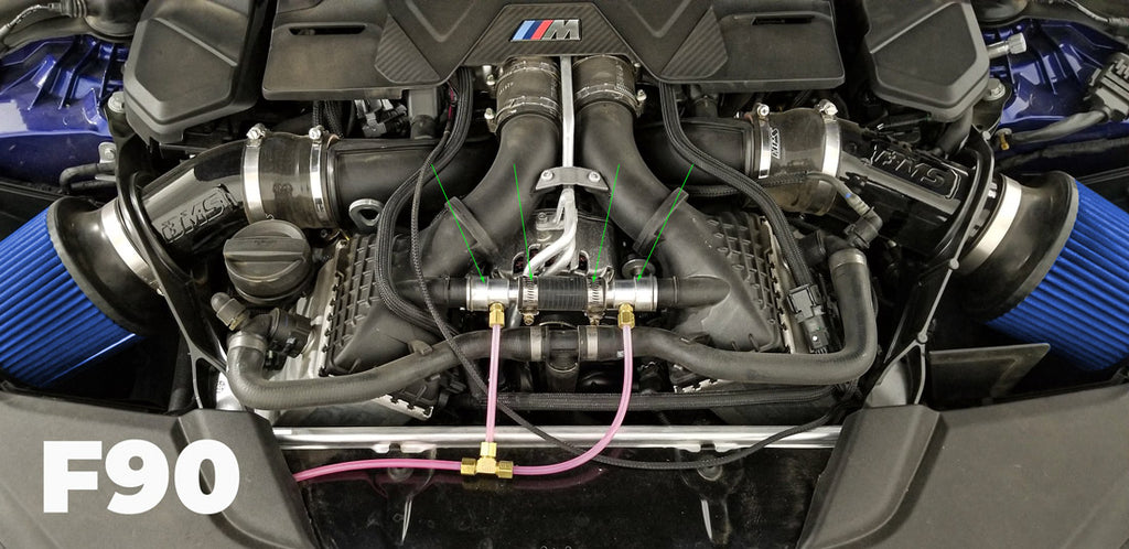 F90 BMW M5 water injection nozzles and adapters in place
