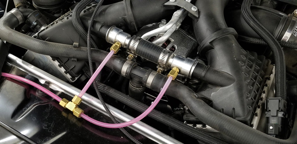 F90 BMS BMW M5 Methanol injection nozzle adapters by Burger Motorsports