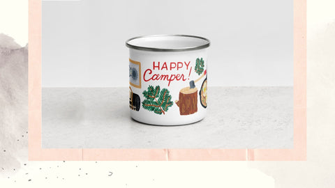 Happy Camper mug with camping essentials painted on by Forage Paper Co