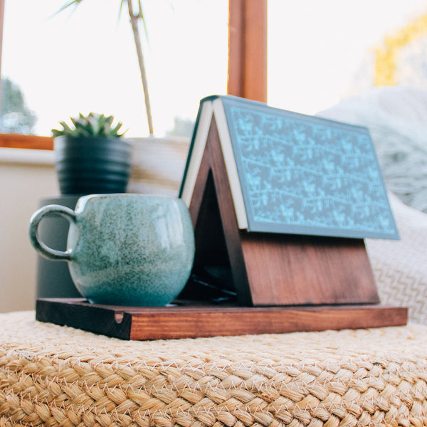A wooden Book valet also known as a book nook, perfect for a cosy reading area or bedside table