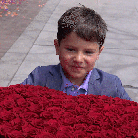boy sending heart roses