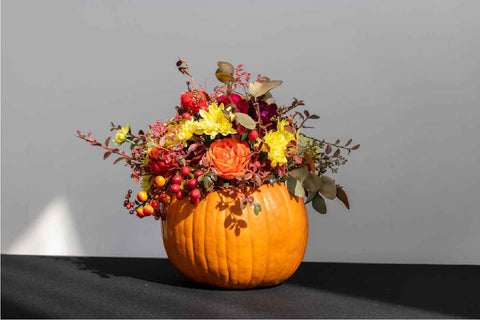 Pumpkin flower arrangement vase