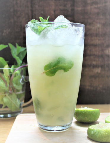 Virgin Apple Mojito, with pressed apple juice and mint sprigs. Perfect for a garden party