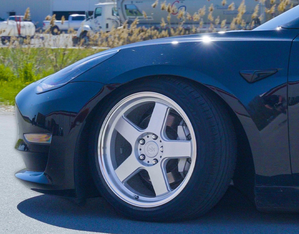 isolated view of avid1 av6 wheels with evolved autosport coilovers