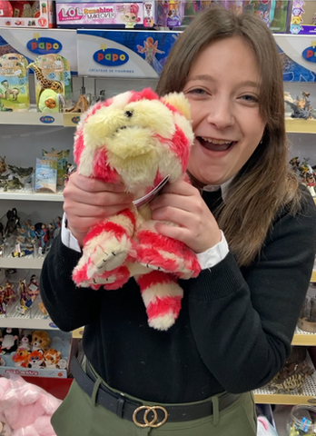 Lydia unpacks the delivery of Bagpuss soft toys