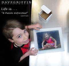 boy making a jigsaw puzzle of himself.  photo of boy making a jigsaw puzzle of his sister.  8x10 puzzle for child