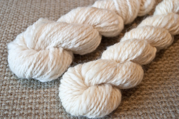 Spindle and wheel spun yarn