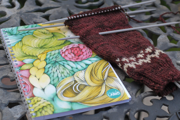 Vive la laine notebook and sweater sleeve in progress