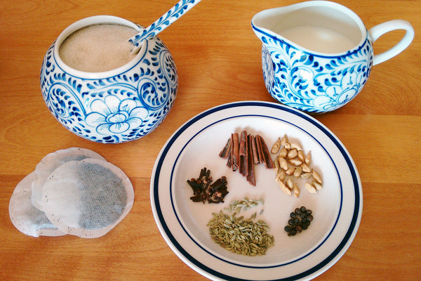 Milk, sugar, and spices for making chai tea
