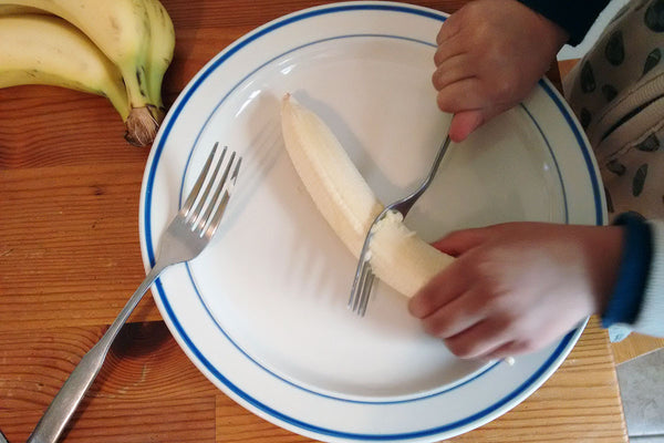 Mashing bananas for banana cake